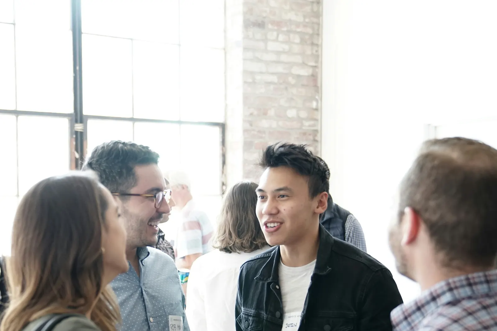 Event guests talking and laughing